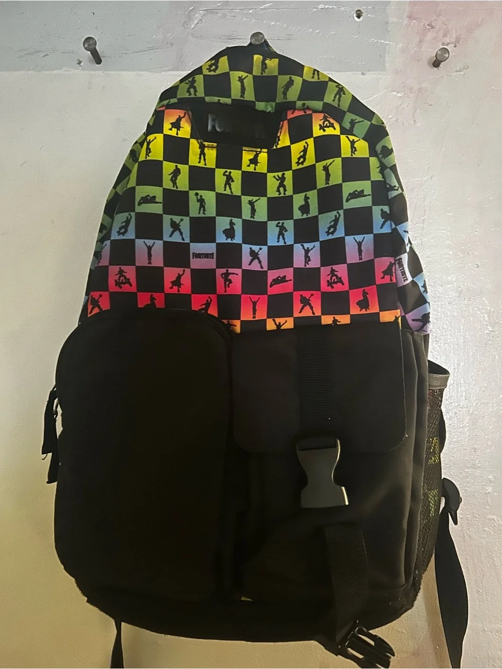 Black Backpack with Rainbow Checkerboard Pattern